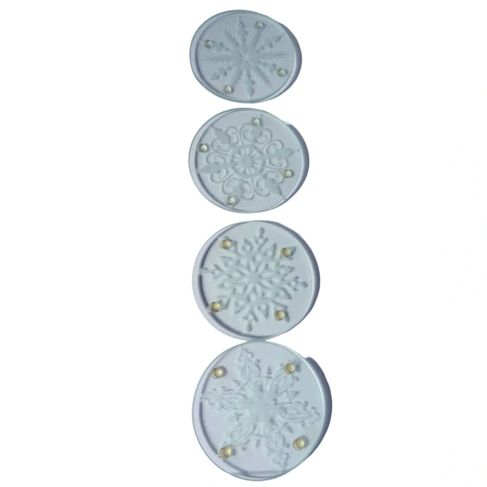 Four Different Clear Snowflake Holiday Coasters with Soft Silicone Feet by Epic.